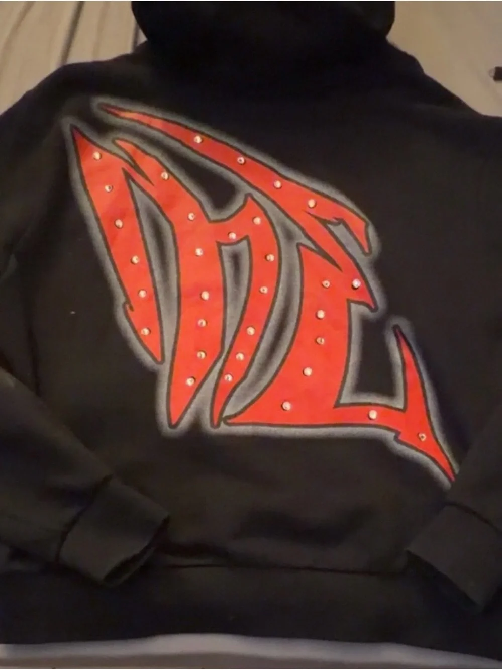 Mixed Emotions Black Zip-Up Hoodie with Red Studded Graphic